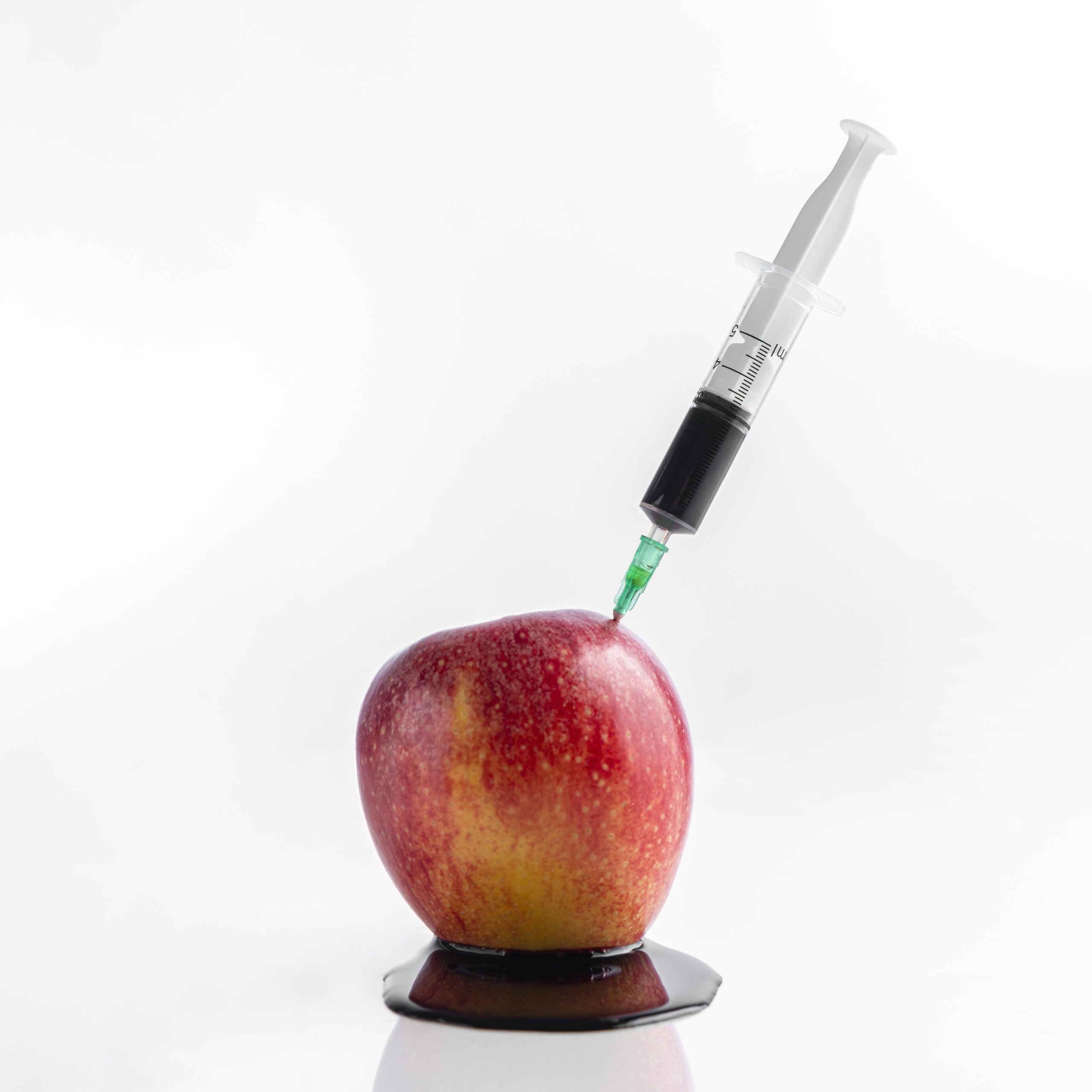 front-view-apple-syringe-with-chemicals