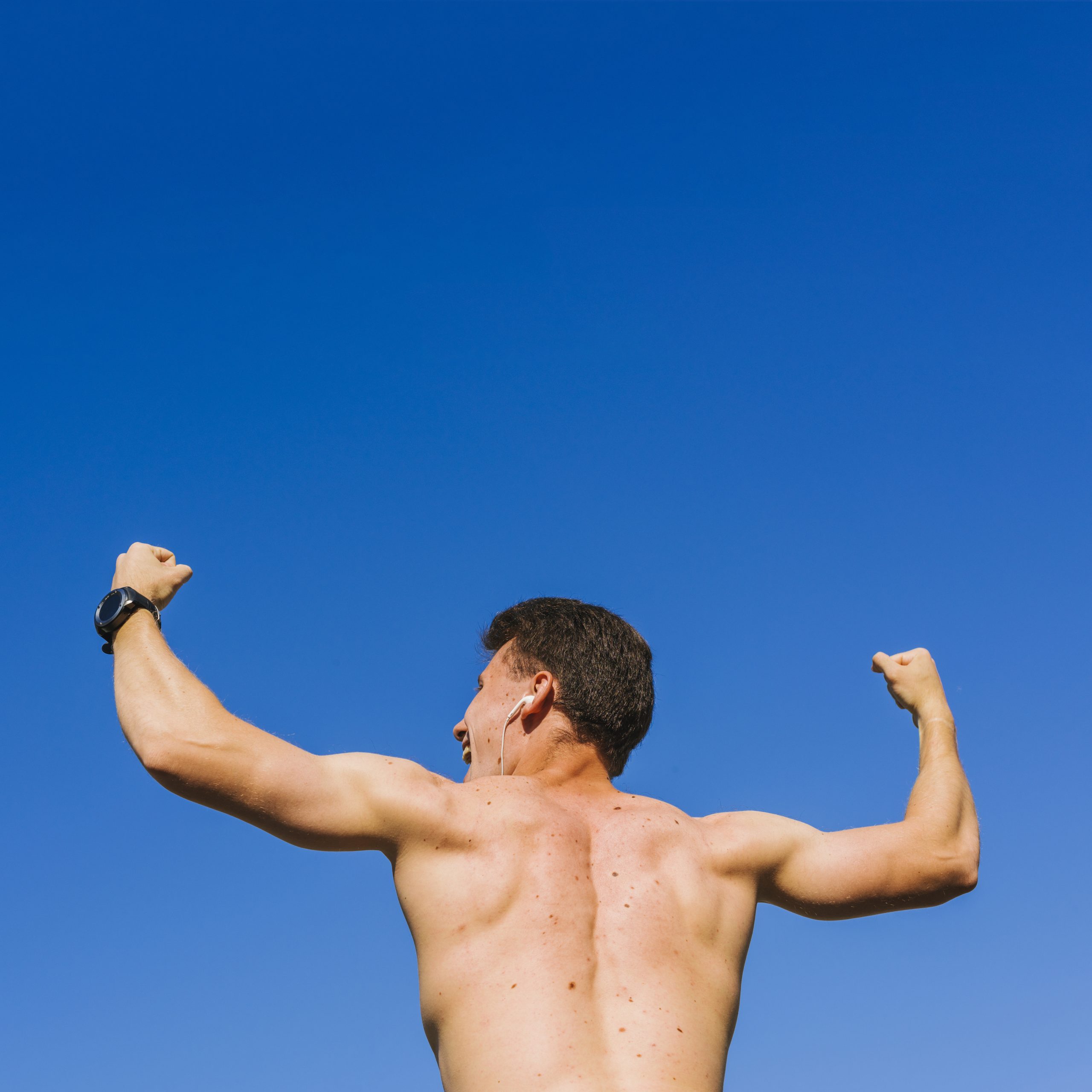 low-angle-shot-body-builder-s-back